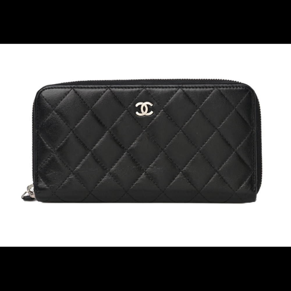 CHANEL
Lambskin Quilted Large Gusset Zip Around Wallet Black